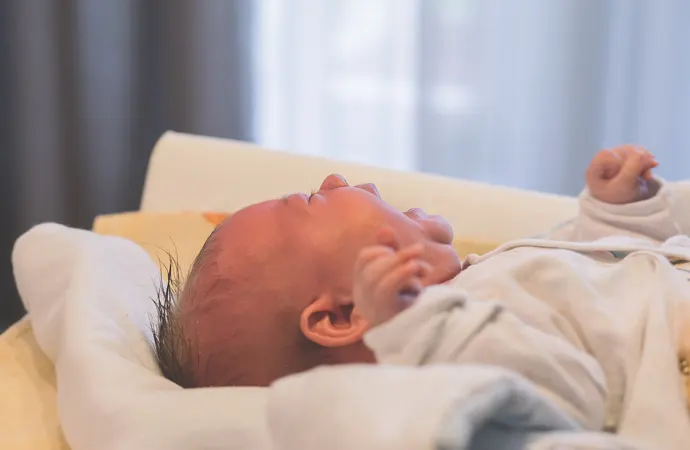Why do babies cry in their sleep?