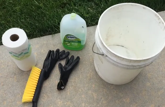 You can start with a mixture of soap and water to clean the pool